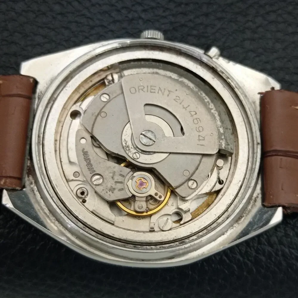 Vintage 1983 Orient Automatic Mens Silver Watch W/daydate & Gold accents